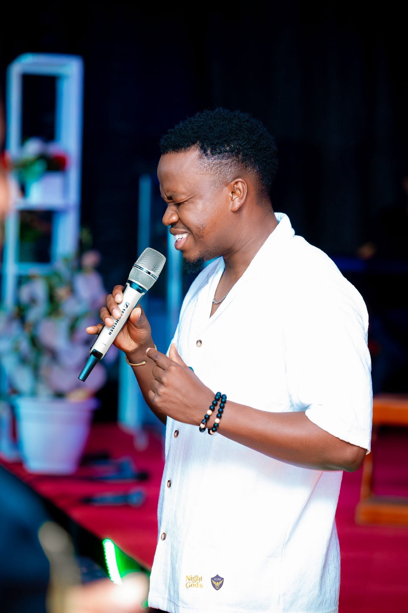 Mika Chavala with the congregation in Kampala